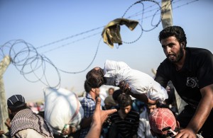 TOPSHOTS-TURKEY-SYRIA-REFUGEES